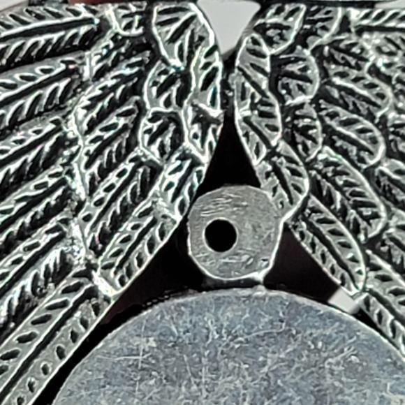 Sterling Silver Pendant with Brown Carved Face, Blue Topaz, and Feather Motif - Picture 4 of 13